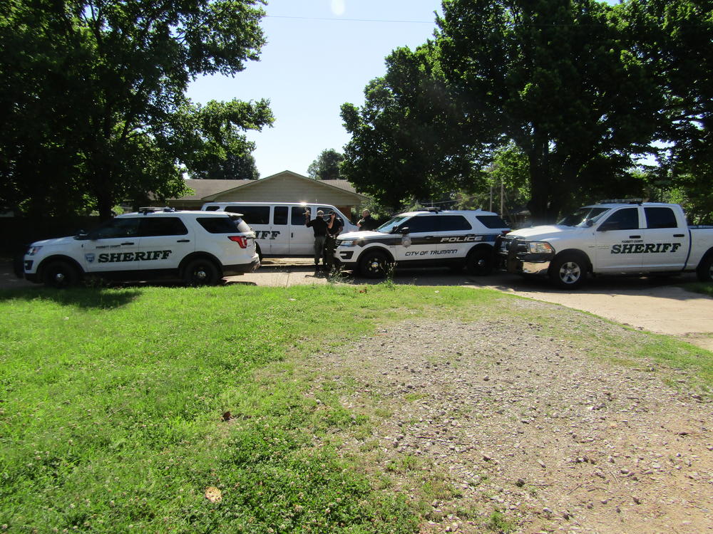 multiple patrol cars outside residence